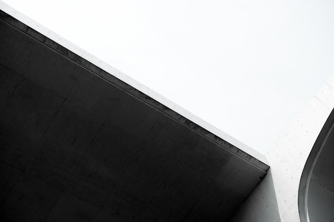 a man flying through the air while riding a skateboard